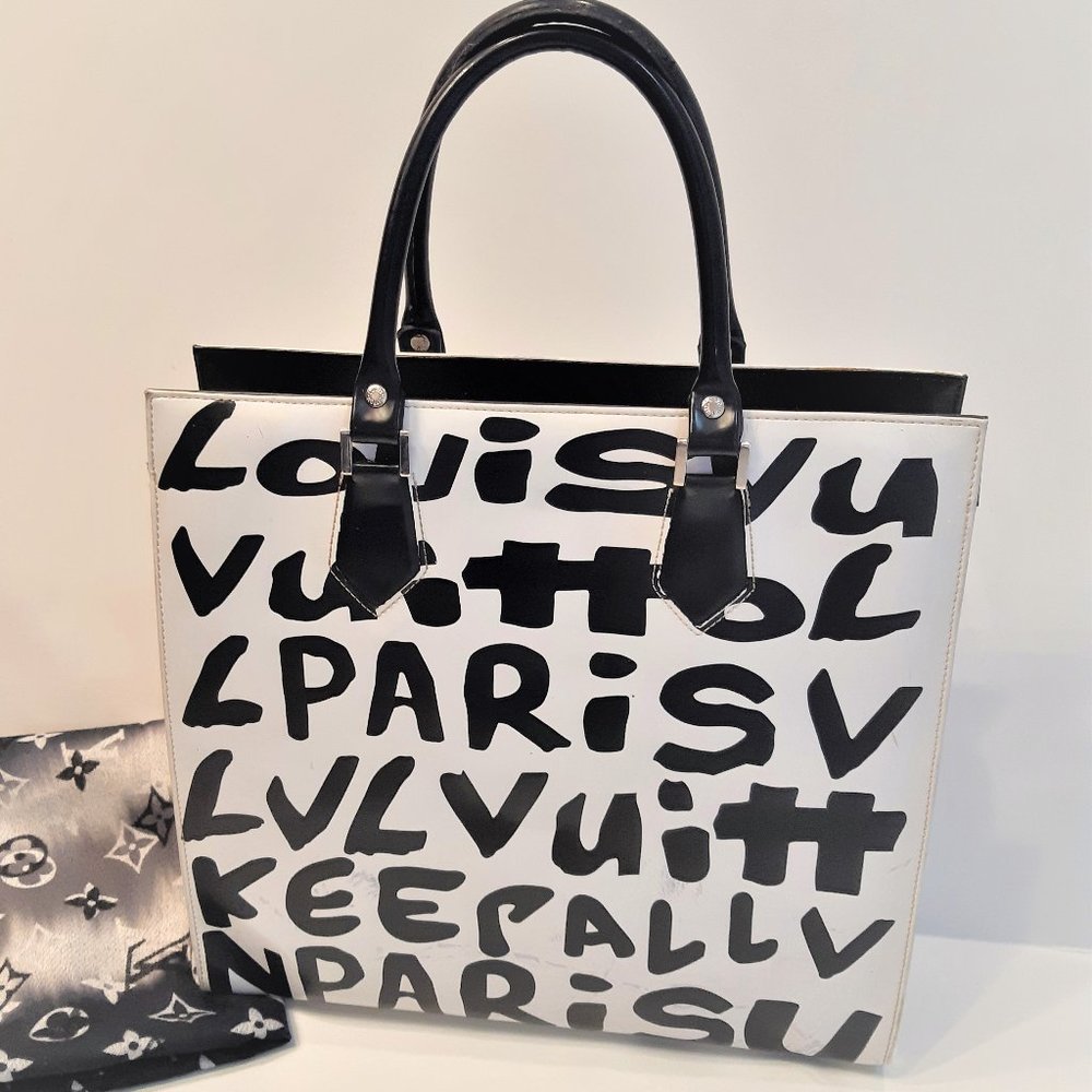 Vintage white bag with black LV letters
